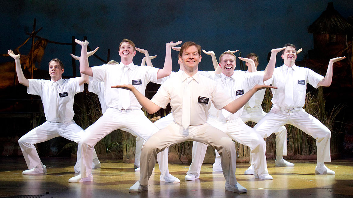 Rory O'Malley and the company of <em>The Book of Mormon</em>.